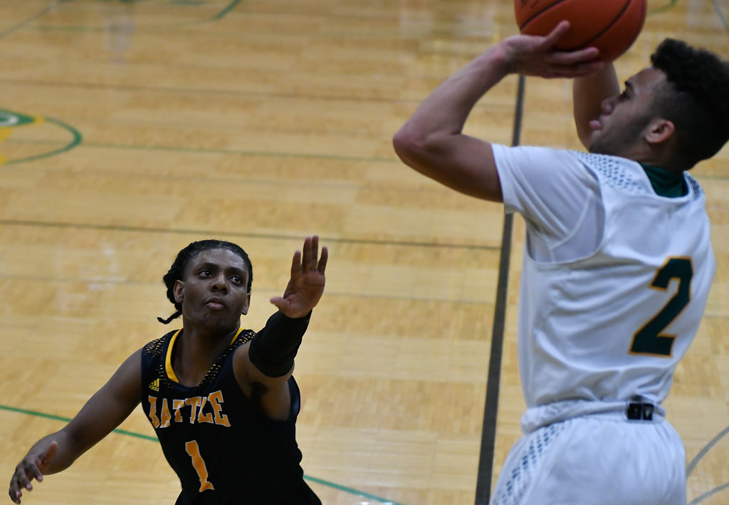 Battles' ZhVaughn Ward guards Rock Bridge guard Xavier Sykes